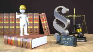Arbeiterfigur auf Rechtsbücher, Paragraphszeichen